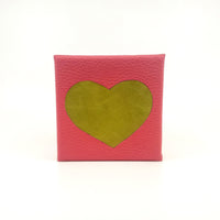 Canvas wrapped in leather and inlayed with a heart wall art home decor unique bubble gum avocado