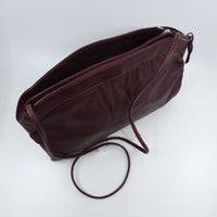 Vintage DeMure Merlot Handbag with Strap. Cool details, leather. Interior zipper pocket. Button closure