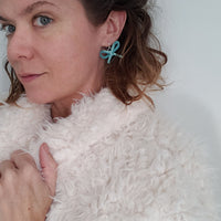 handmade leather statement earrings bow petite turquoise model